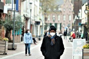 Man in mask on street